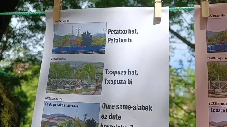 Aita Larramendi ikastolako guraso talde baten protesta, Aldundiak N1 pareko lastozko panelak kendu dituelako
